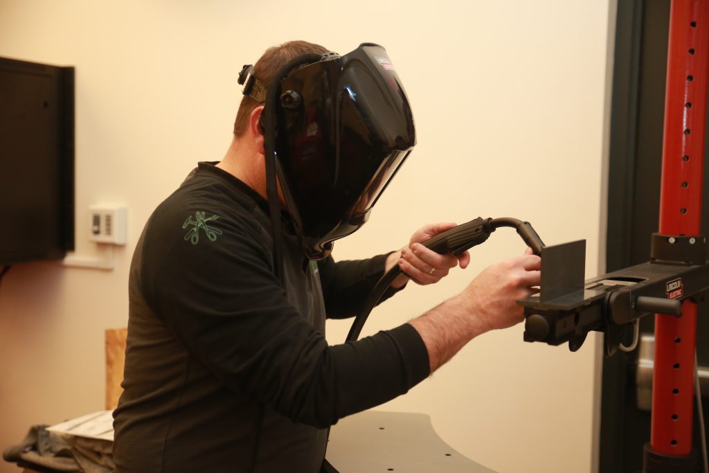 A person using virtual welding technology