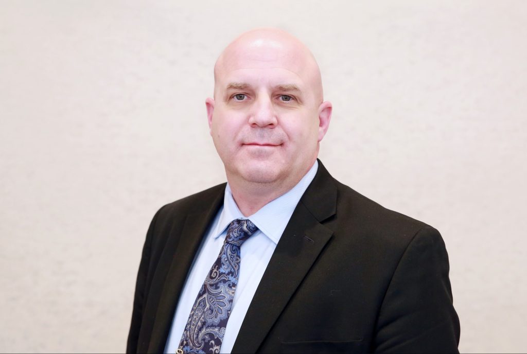 Headshot of Ron McGuire