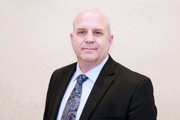 Headshot of Ron McGuire