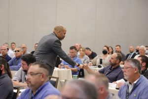 Dushaw Hockett fist bumping during his presentation